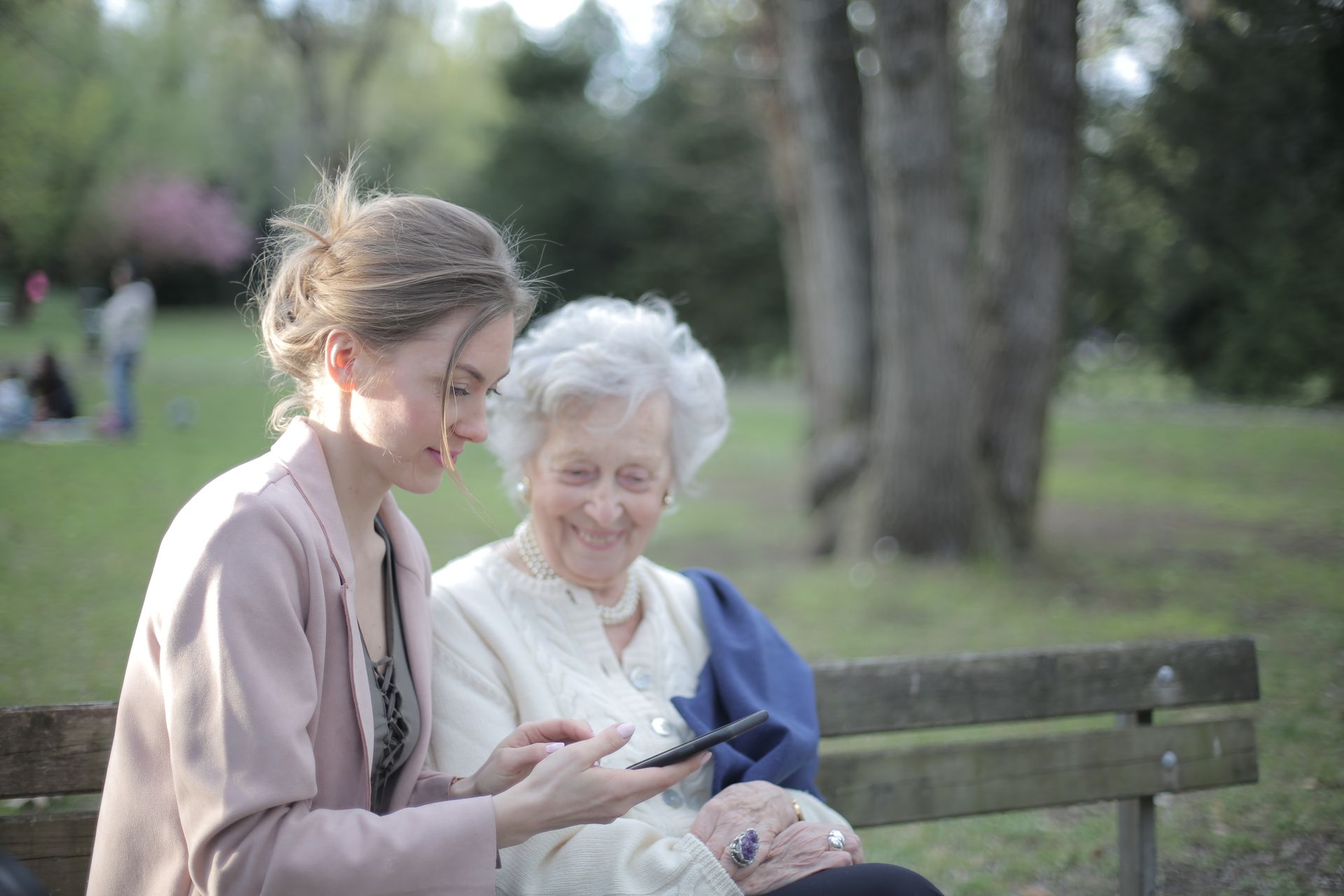 Attentive private companion sharing a calm conversation and daily routine with an older adult